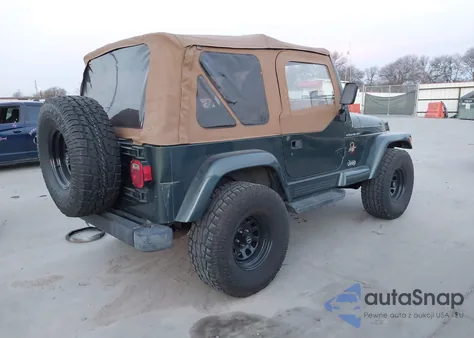 2002 Jeep Wrangler Sahara z USA, uszkodzony, nr VIN 1J4FA59S02P776657